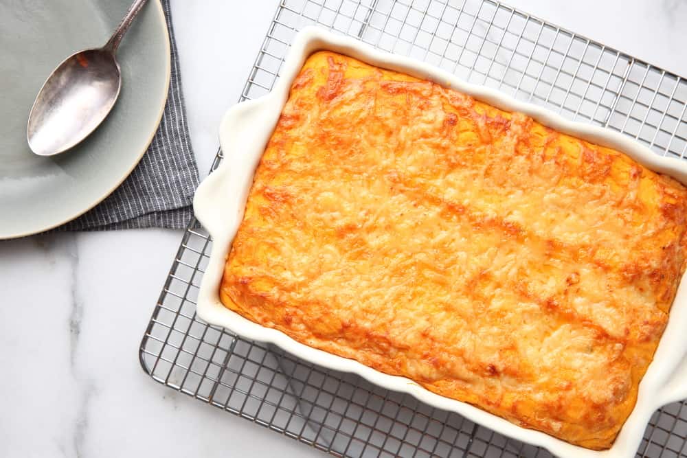 Sweet Potato Souffle in baking dish on cooling rack