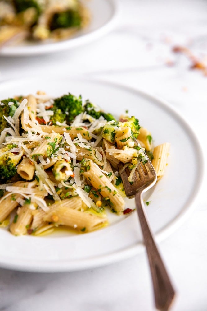 Broccoli pasta on plates with fork