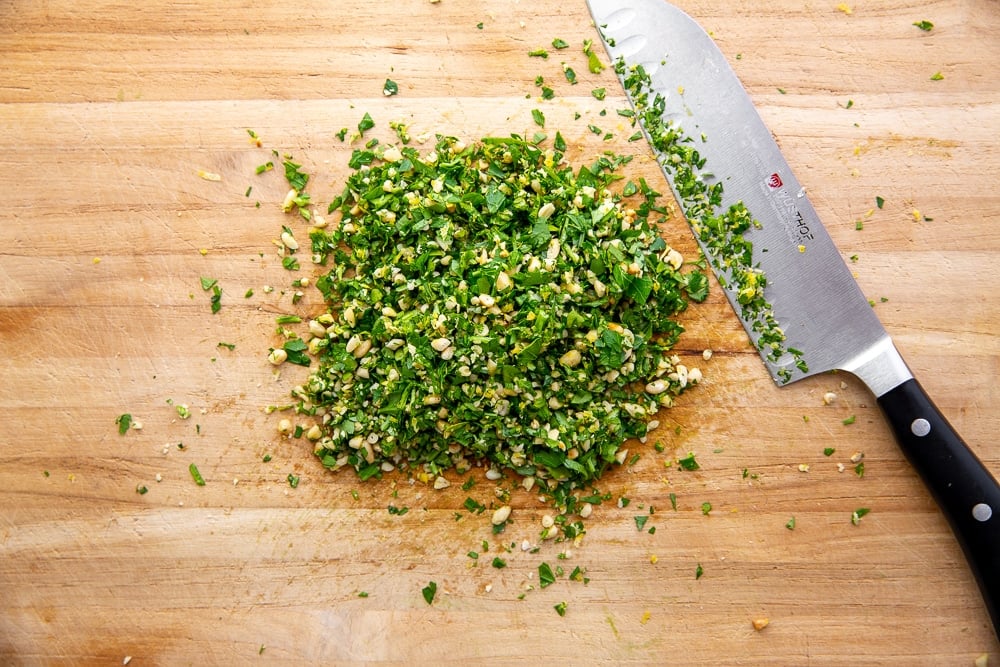Gremolata on cutting board to sprinkle over the broccoli pasta