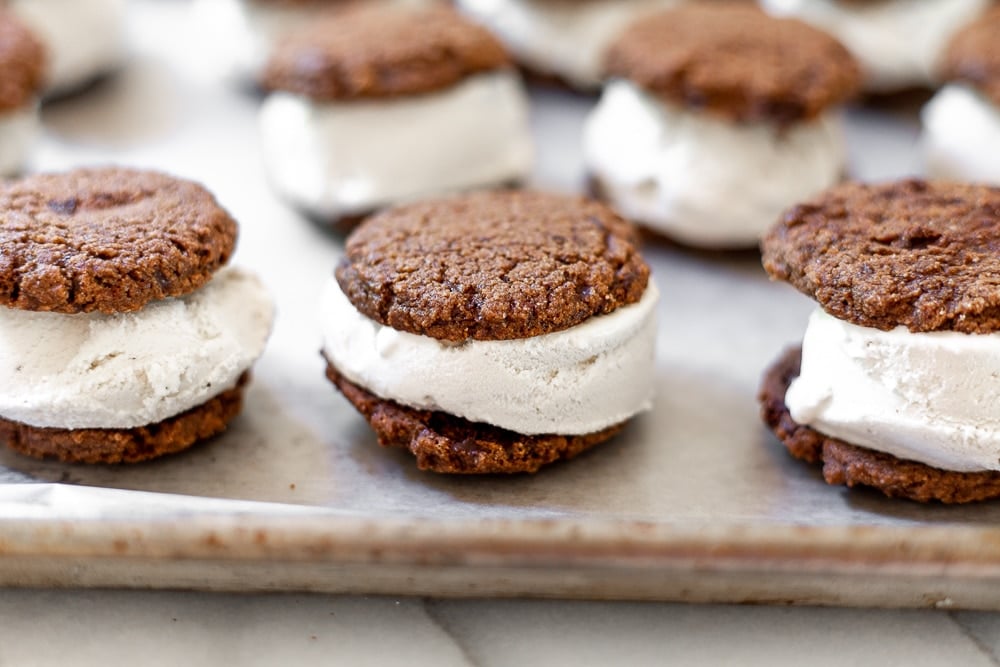 Vegan ice cream sandwiches lined up on sheet pan