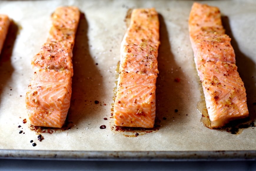 Perfectly cooked roasted salmon is one of the quickest and easiest of weeknight meals, and this maple-glazed version with sweet pea pesto will rock your world.