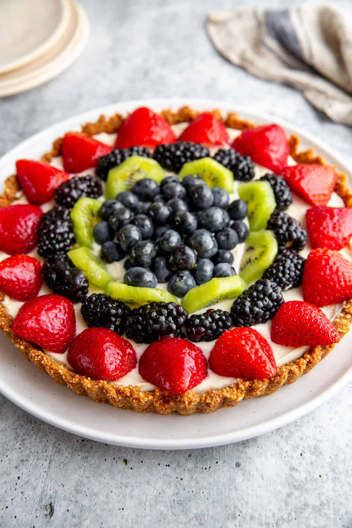 a finished gluten-free tart on a white plate