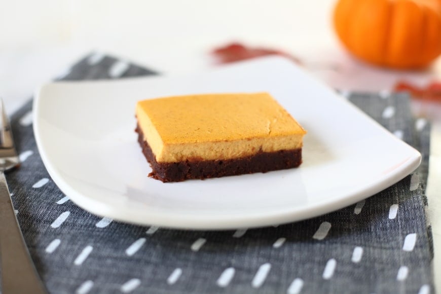 Gluten free pumpkin cheesecake brownies on plate