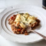 You won’t miss the meat in this hearty but healthy vegetarian lentil shepherd’s pie! A rich lentil and mushroom base gets topped with a creamy cauliflower and parsnip crust and is capped off with melted gruyere.