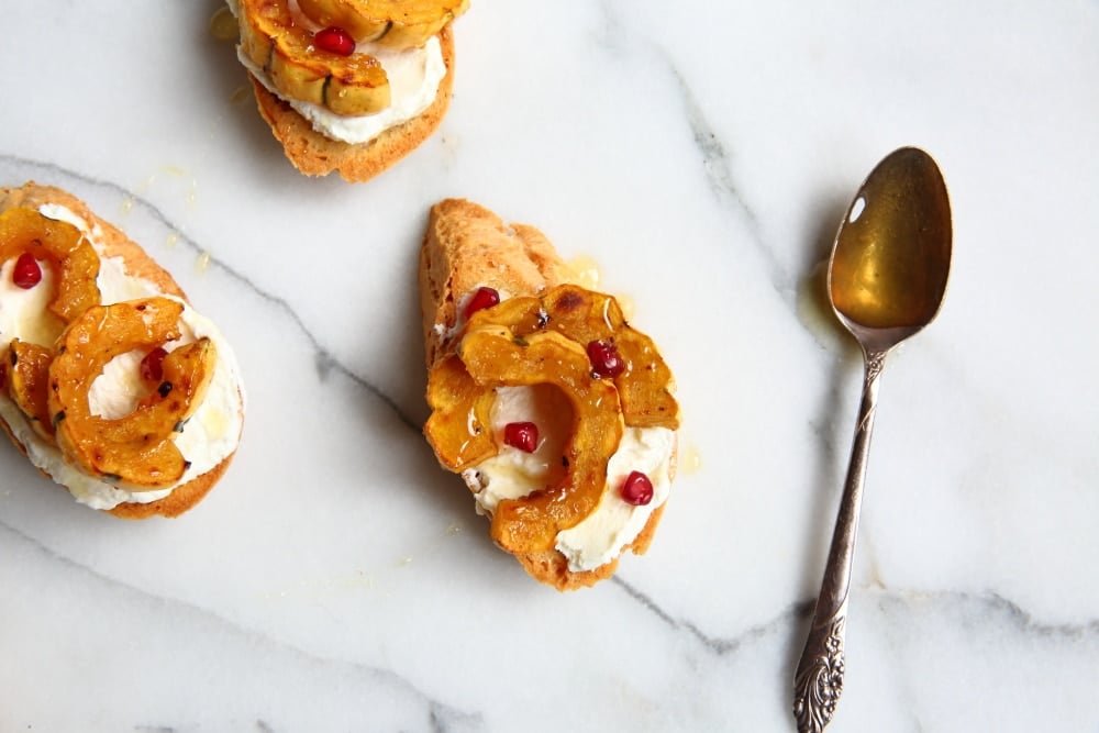 Roasted delicata squash on crostini with goat cheese