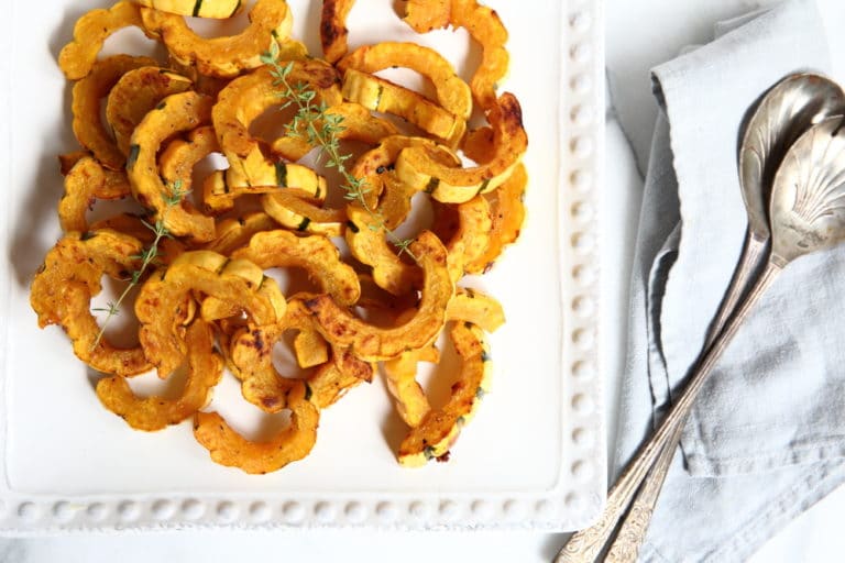 Roasted delicata squash on platter