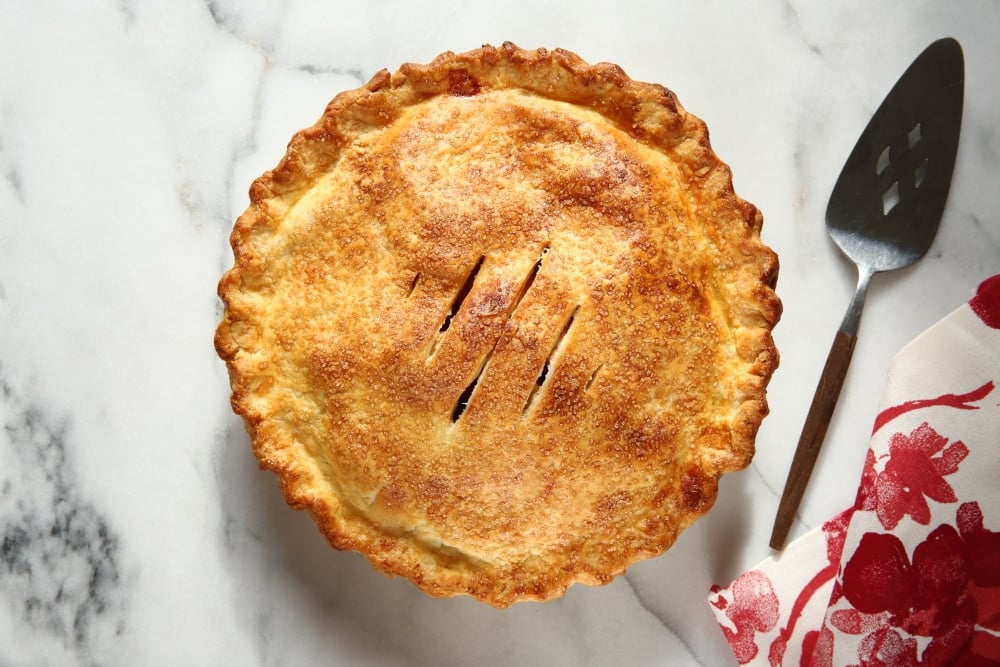 Gluten free pie on a marble surface. 