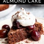 A slice of gluten free chocolate almond cake on a plate.