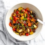 Ratatouille in large bowl with serving spoon