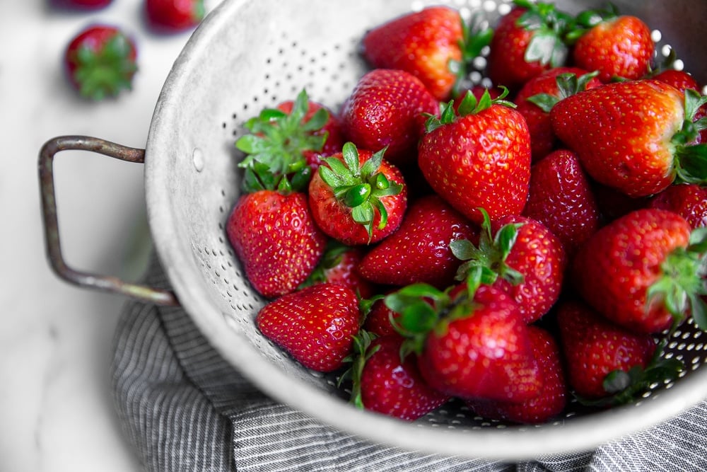 Washed strawberries in colander