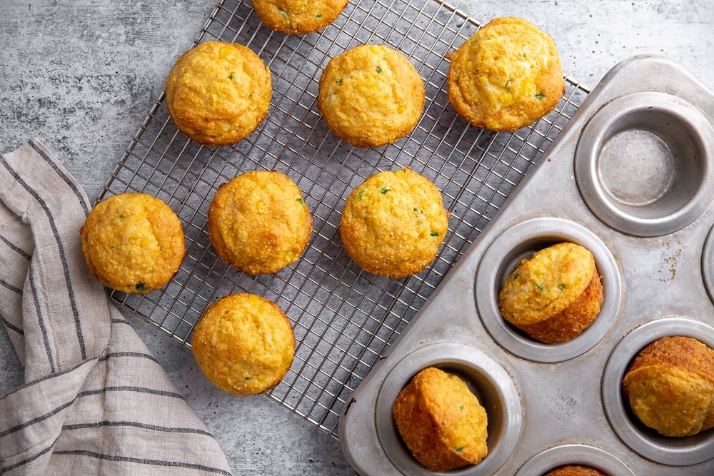 Jalapeno Cheddar Cornbread muffins on a cooling rack.