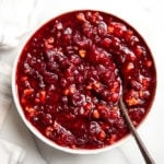 Easy cranberry sauce in a serving bowl with a spoon.