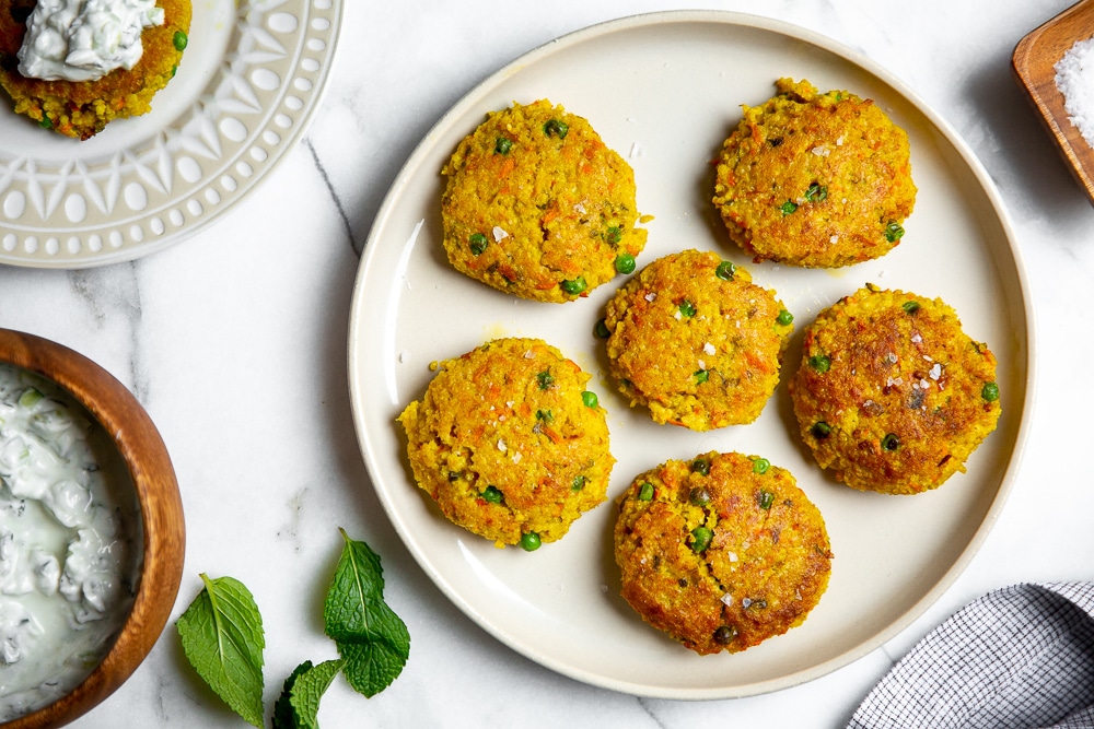 Curried millet cakes, a pantry recipe, on a plate. 