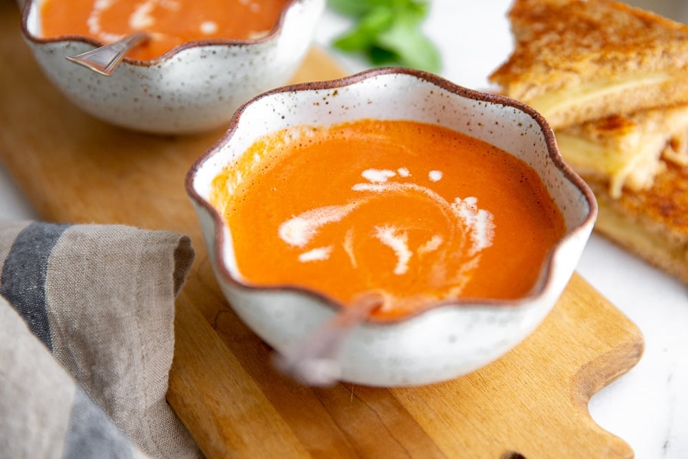 Tomato soup on a serving board. 