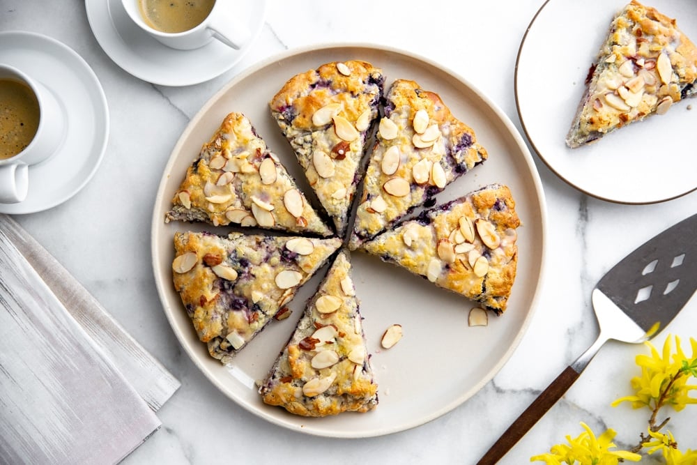 Overhead shot of a platter of gluten free blueberry scones.