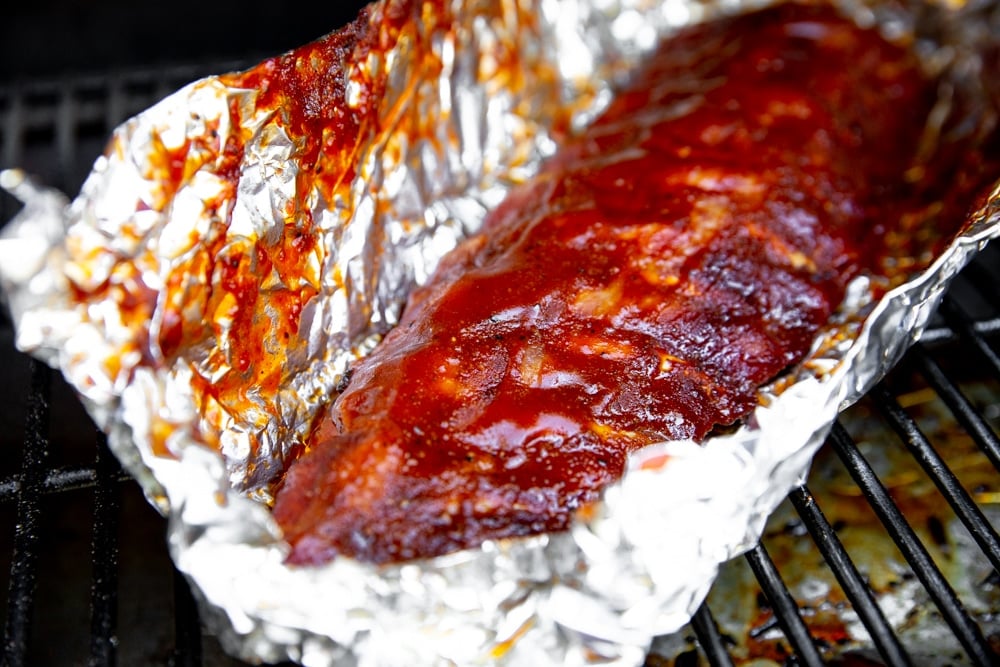 Barbecue ribs on a smoker. 