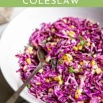 Red cabbage and corn coleslaw in a bowl.
