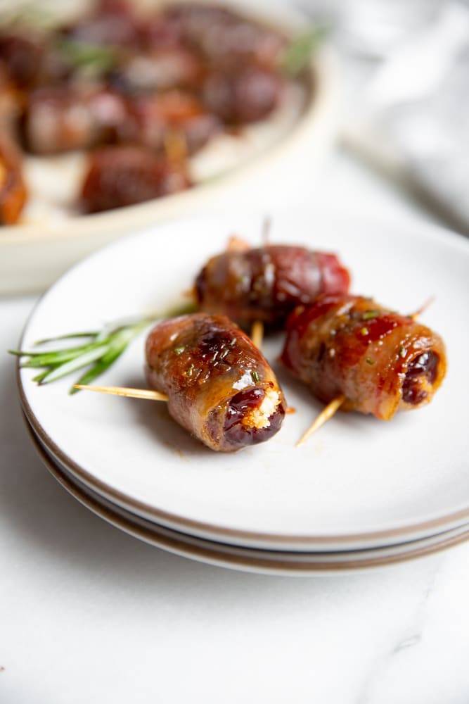 Close up of three devils on horseback on a small serving plate.
