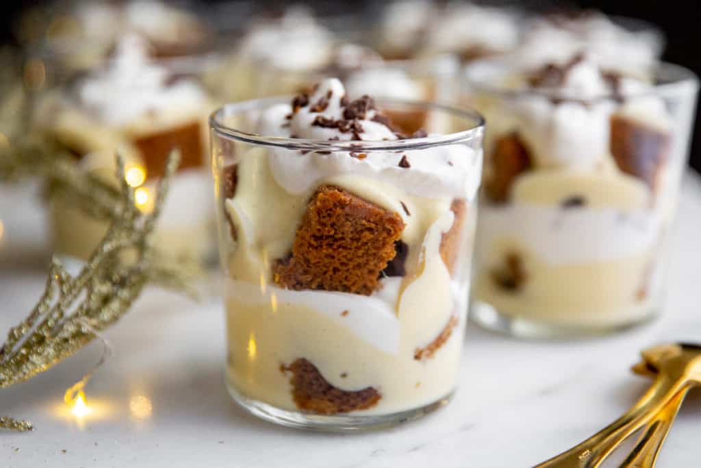 Gluten free gingerbread trifle in serving glasses.