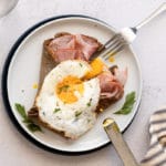 Buckwheat crepe filled with ham and topped with a fried egg.