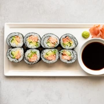 Homemade sushi on a serving platter.