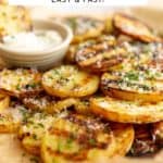 Grilled potatoes on a platter.