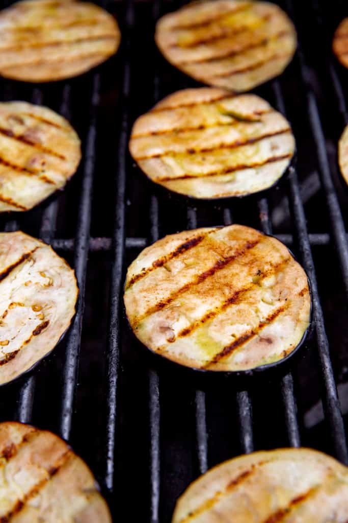 Eggplant slices on a grill. 