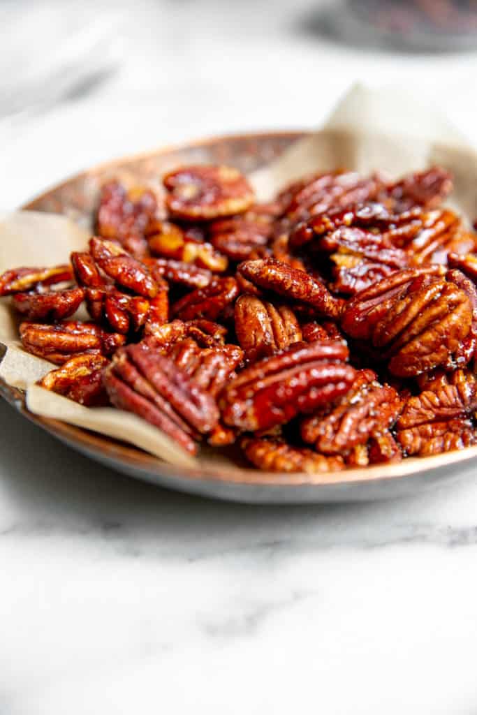 Candied pecans in a serving dish. 