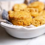 Gluten free biscuits in a serving dish.