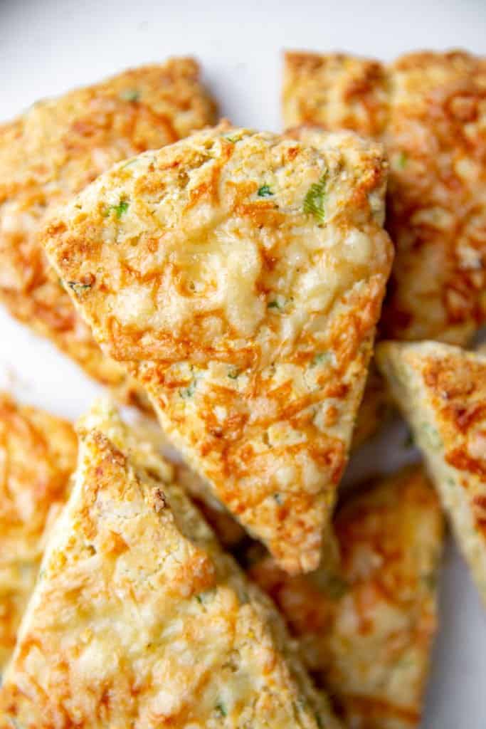 Overhead close-up of a savory cheese scone. 