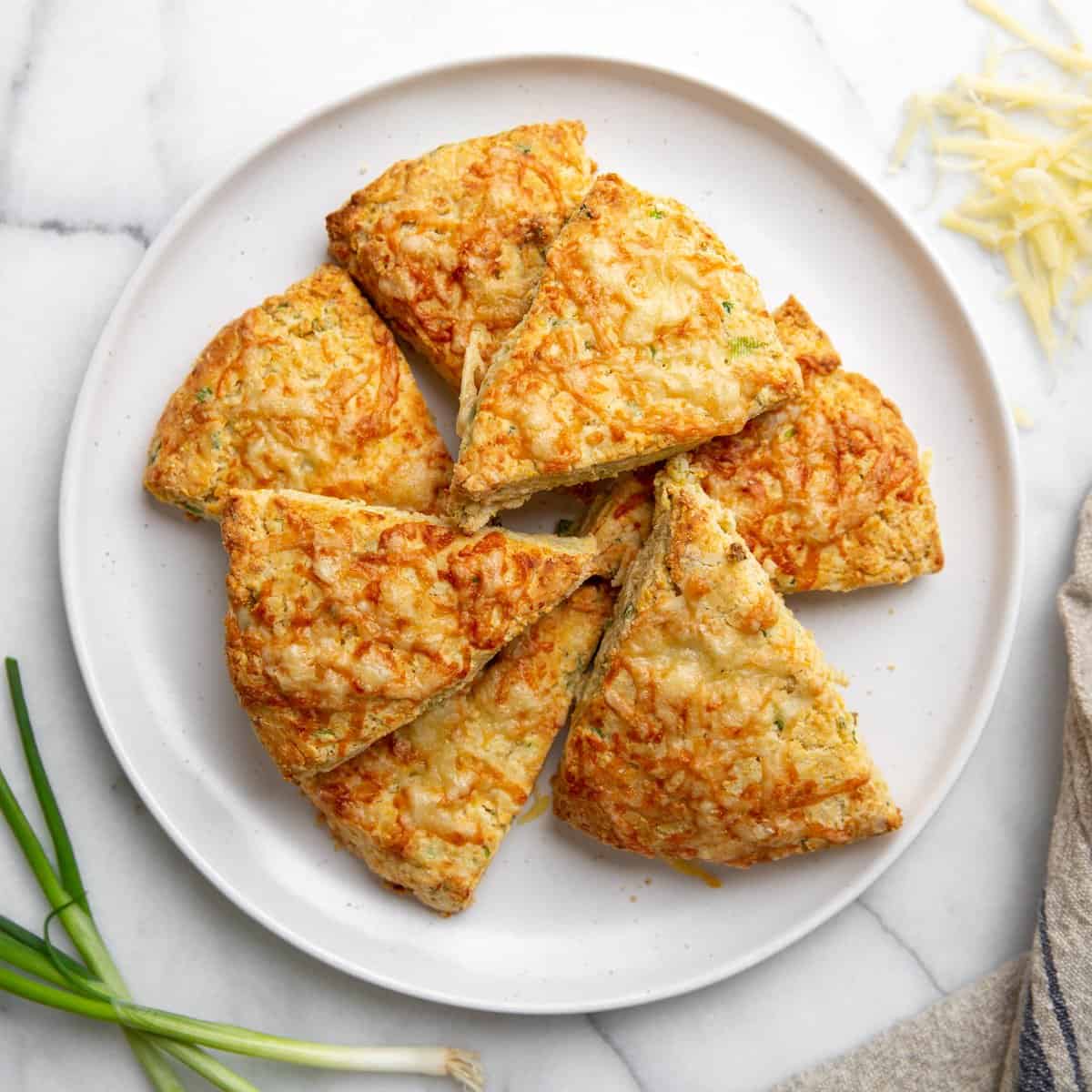 https://fromscratchfast.com/wp-content/uploads/2022/02/Savory-Cheese-Scones-Recipe_SQUARE.jpg