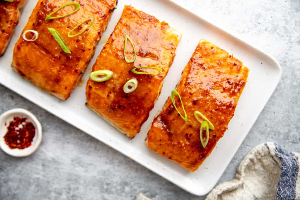 Miso salmon fillets on a serving platter. 