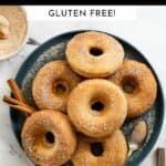 Gluten free baked donuts on a serving platter.