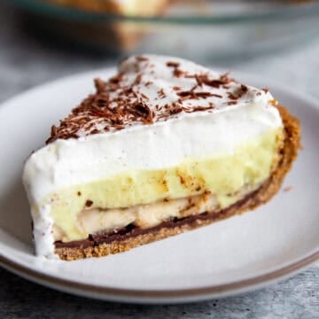 a slice of vegan banana cream pie on a plate