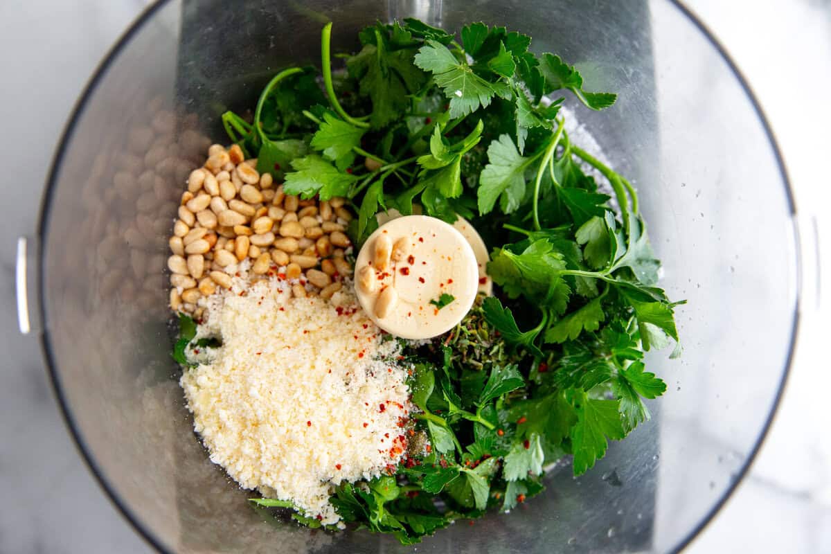 Italian salsa verde ingredients in a food processor 