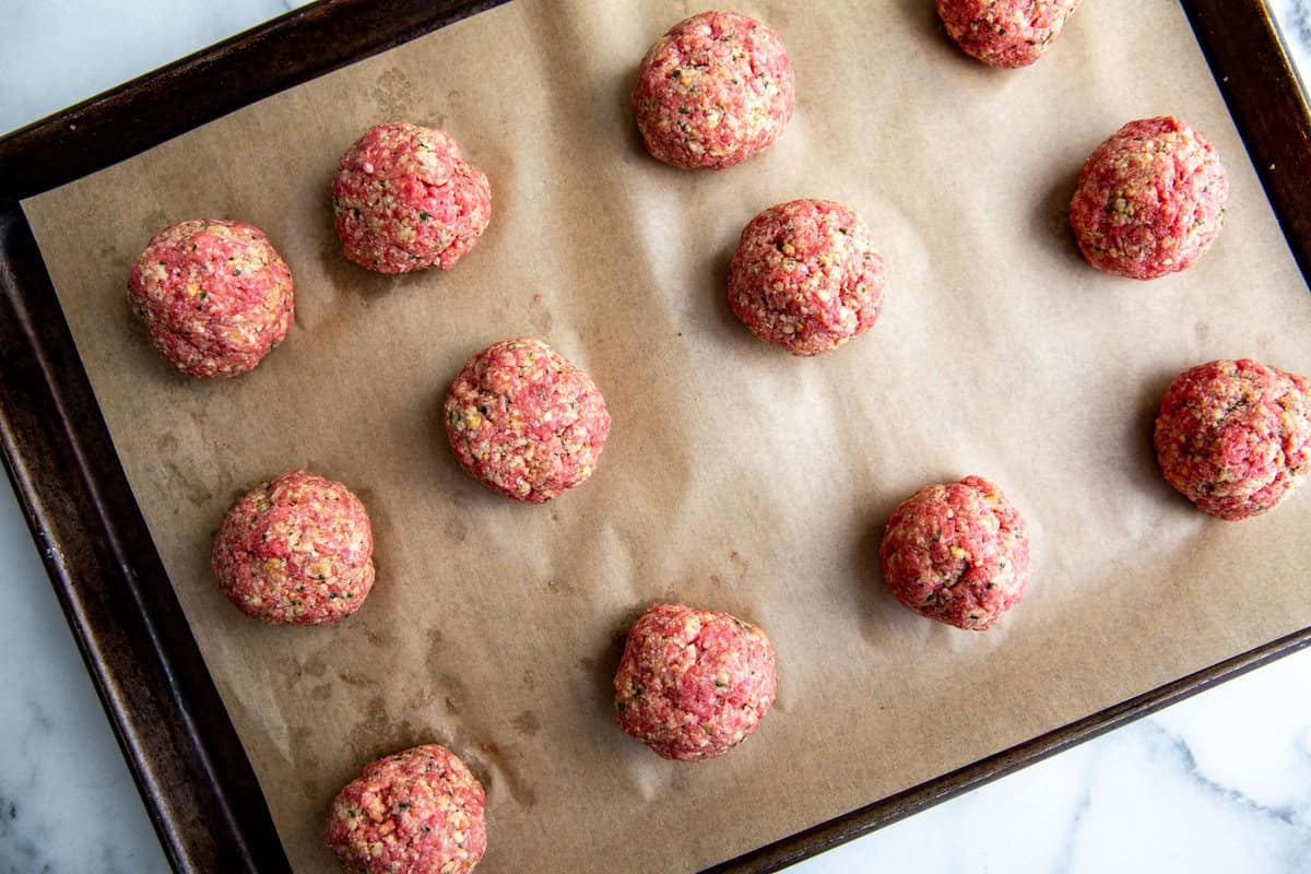 meatballs on a lined sheet pan