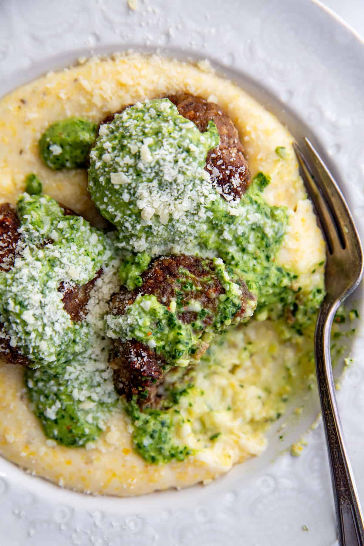 A close up of bison meatballs in a bowl 