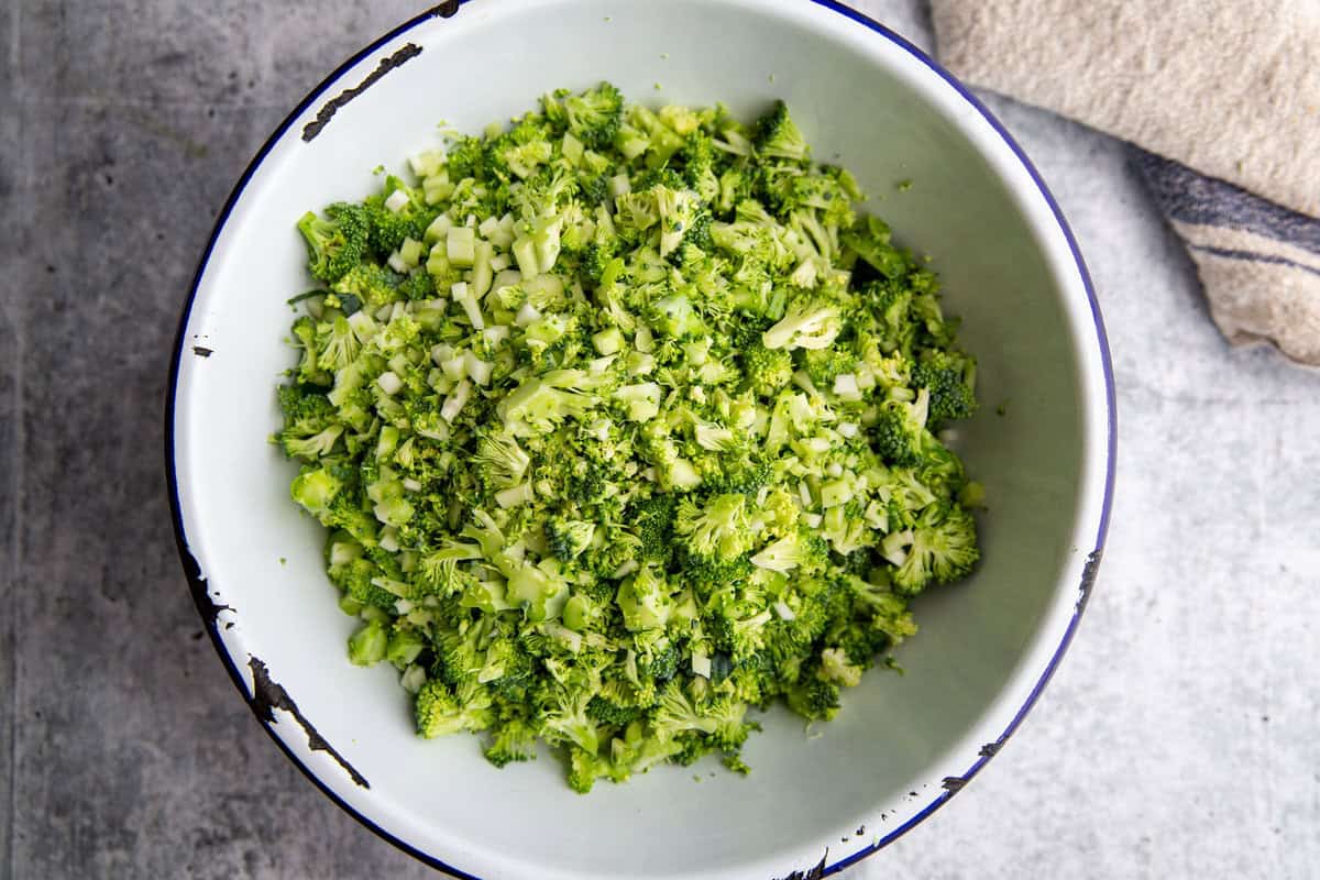 raw broccoli chopped in a bowl