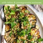 Grilled eggplant and zucchini slices on a platter.