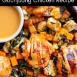 Gochujang chicken on a sheet pan with vegetables.