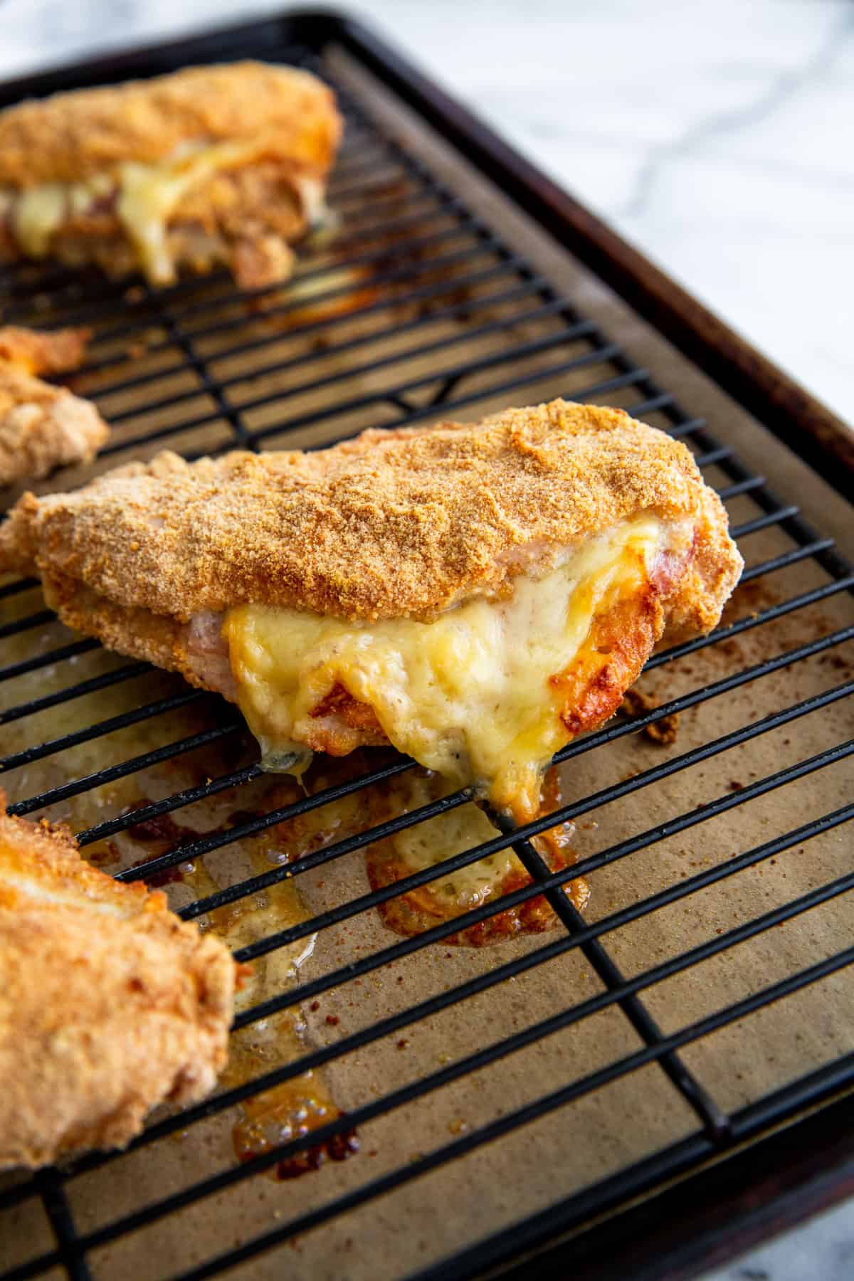 baked stuffed chicken on a wire rack 