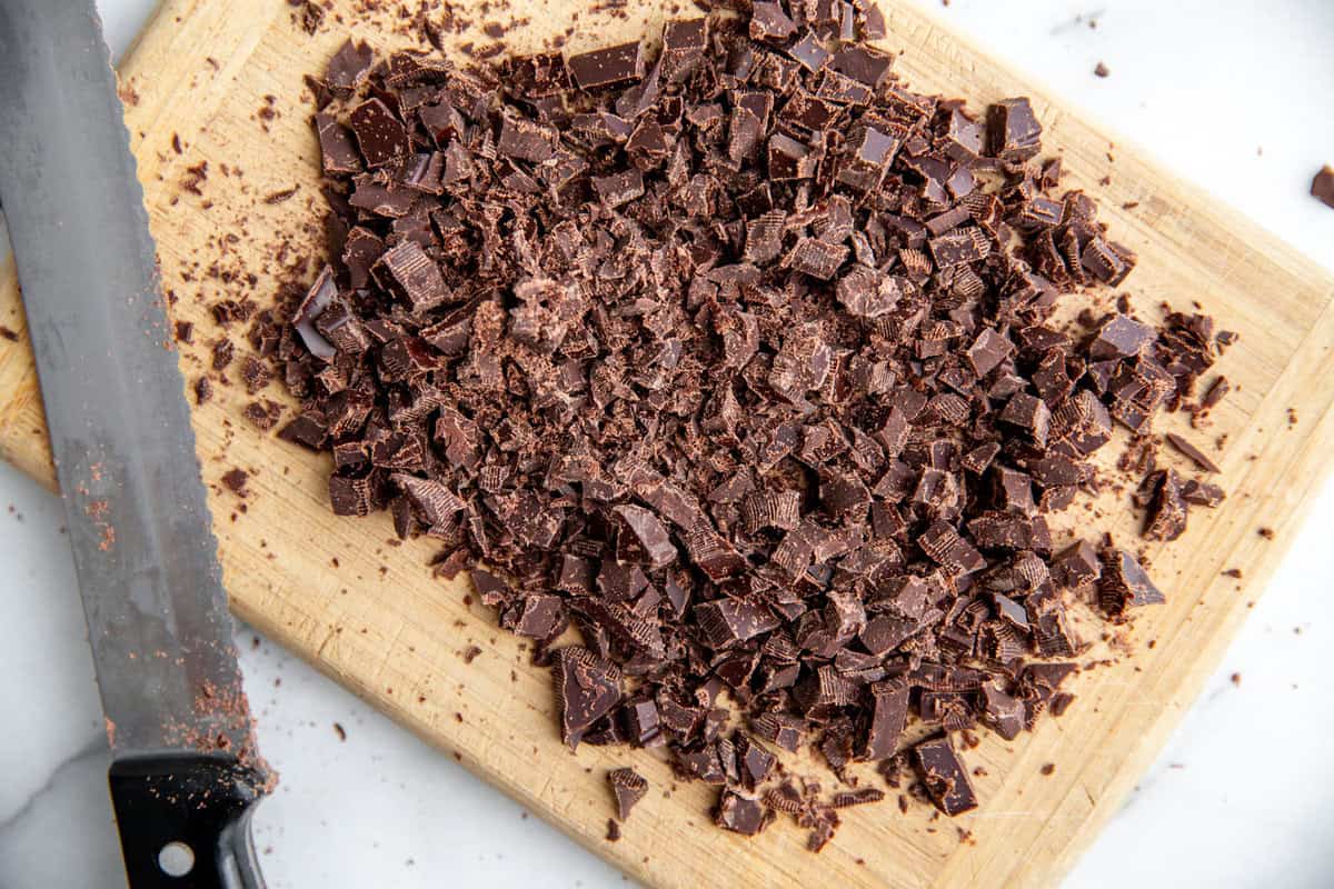 chopped chocolate on a cutting board 