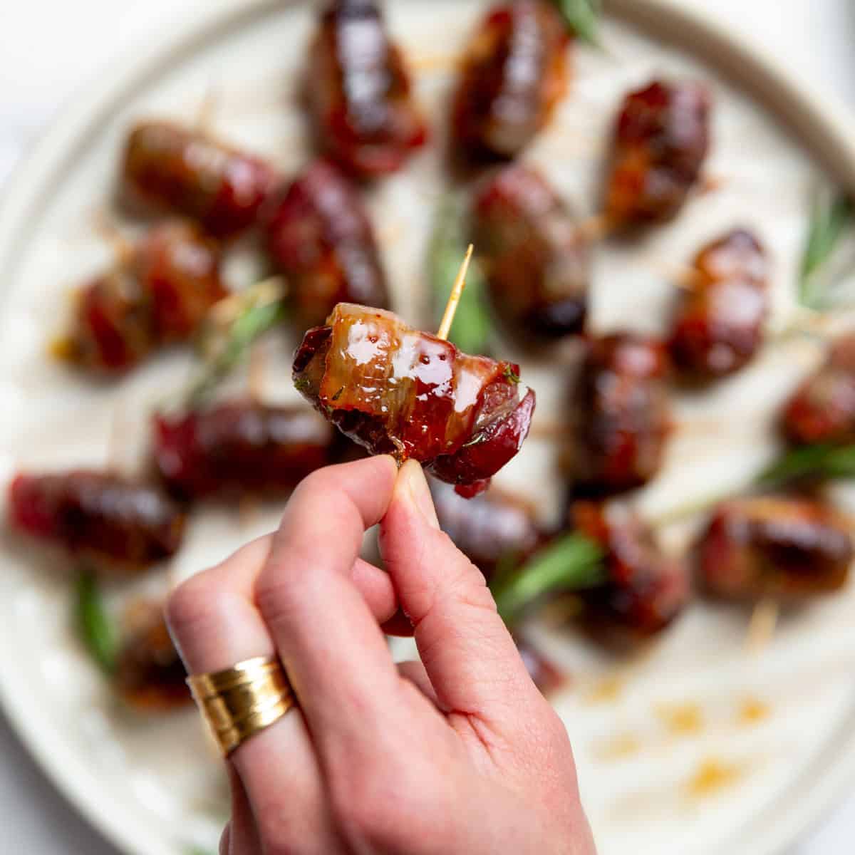 Platter of bacon wrapped appetizers.