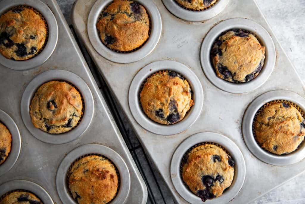 baked muffins in a tin out of the oven.