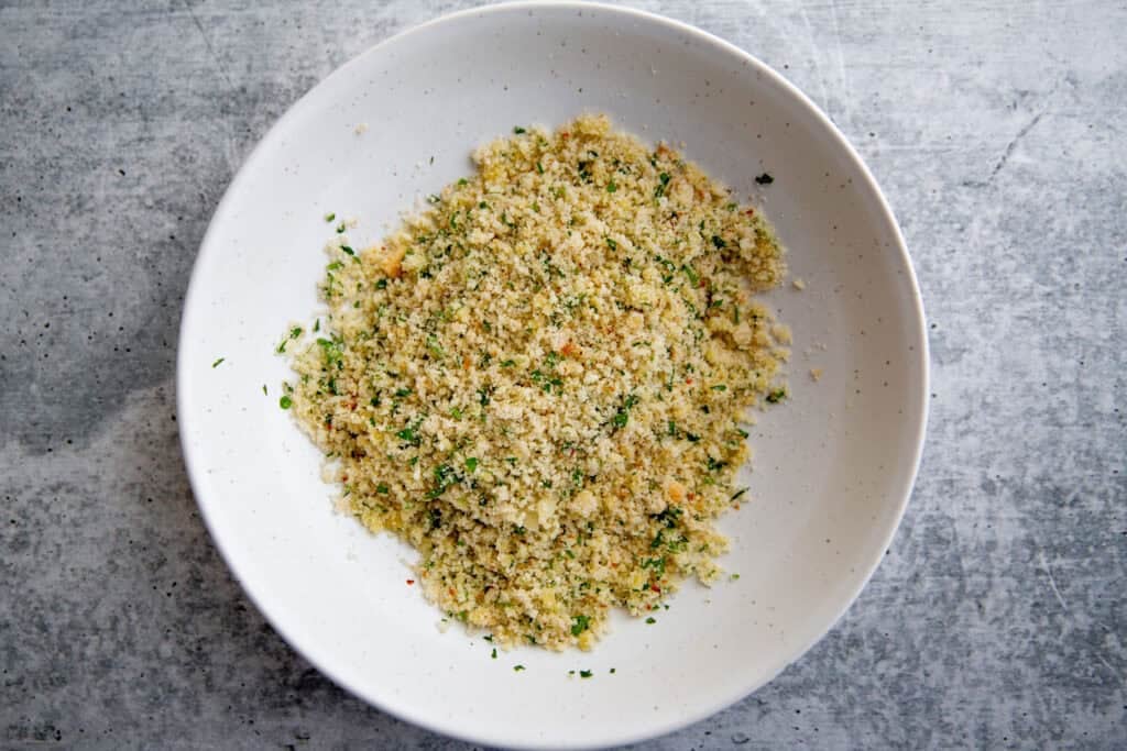 parmesan and breadcrumbs in a shallow bowl
