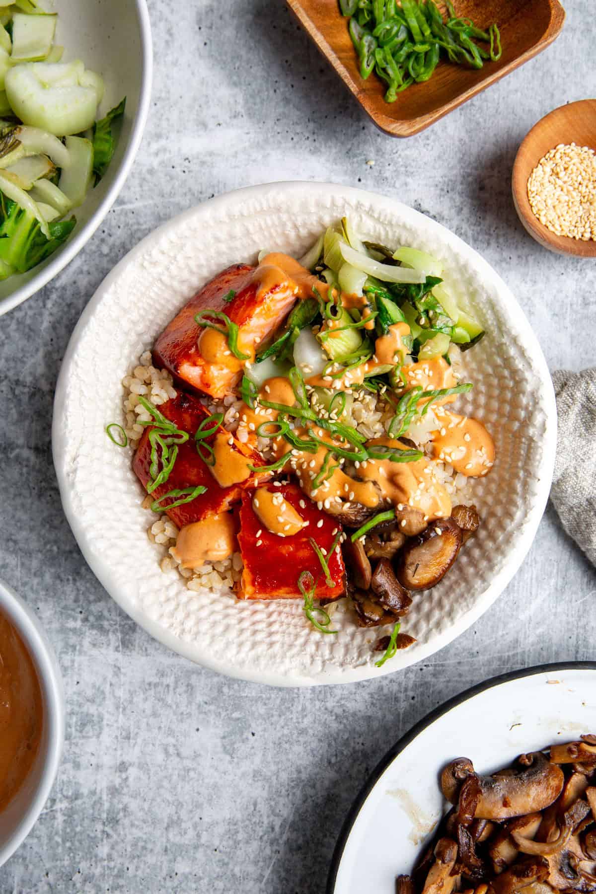 gochujang salmon cooked and built into a bowl for a delicious and easy meal 