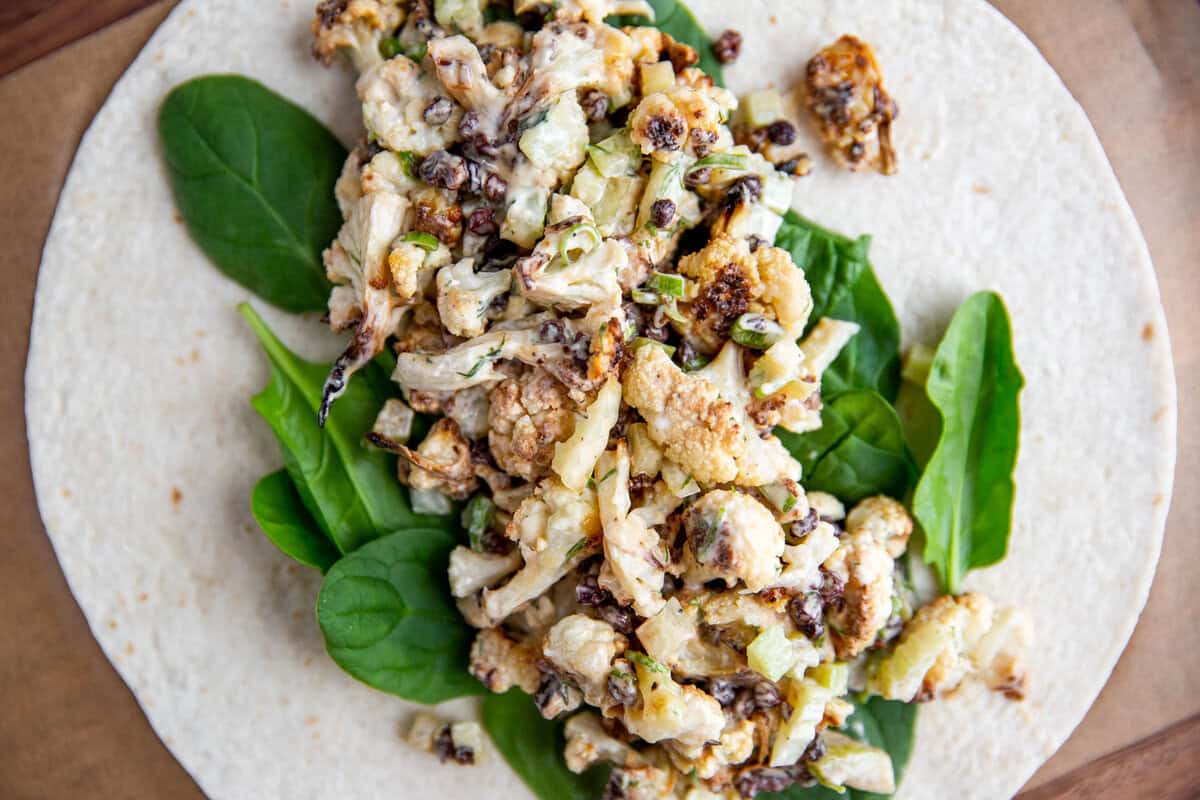 cauliflower salad over a bed of greens