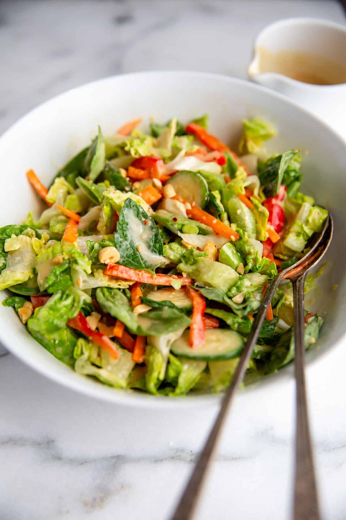 A salad tossed with miso salad dressing. 